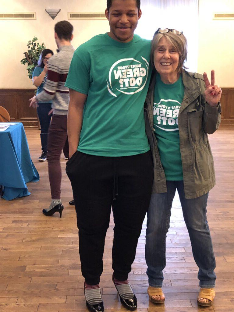 students wearing green shirts